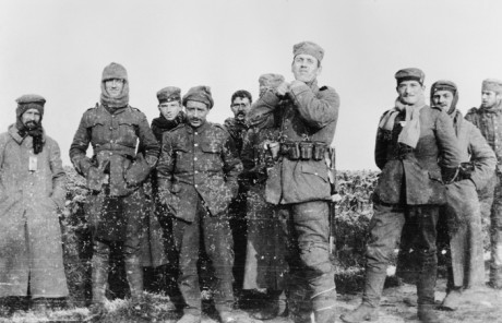 Second Lieutenant Cyril Drummond took this photograph of soldiers from the Royal Warwickshire Regiment talking happily with men from the 134th Saxon Regiment on Boxing Day.