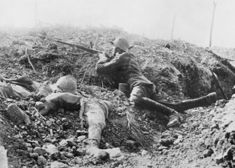 A German soldier takes aim, surrounded by French dead, at Verdun. Imperial War Museum/ Centenary Partnership Programme ref Q 23760. 
